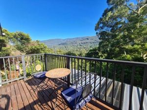 Image of 'Wahroonga' home among the Gum trees in Warburton