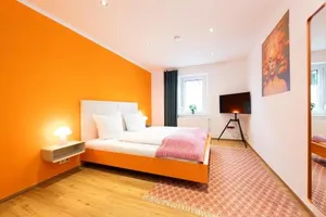 Image of Bunter Hund Apartments - Zentrales Apartment, Parkplatz, Wintergarten, Kinderzimmer