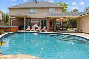 Image of Boutique Bunkhouse Sleeps 20 Pool Hot Tub OutletMall TheatreRm EV Friendly