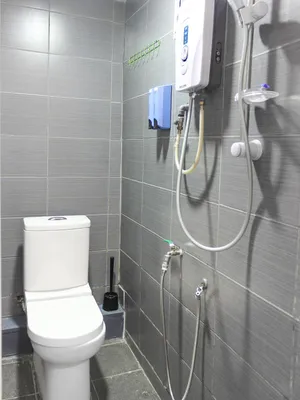 Image of SPOT ON 89832 Famili Inn Ombak Rindu