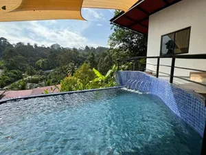 Image of Hillside Red Cabin