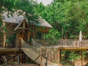 Image of "Magical Treehouse" w spiral slide off the deck 350 acres on the Brazos River! Tubing! Petting Zoo!