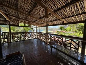 Image of Tranquil Getaway Lilly Room, Dahlia Room, Aster Room and Poppy Room & Dive Center