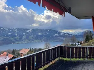 Image of Vista D'oro sul Lago E Monti