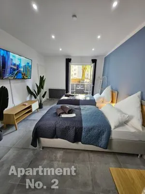 Image of Modern Homes - Voll ausgestatte Wohnung - Balkon - Hotelbetten - 4K TV - WLAN
