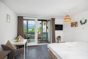 Image of "Boho Oase" with lake view and pool