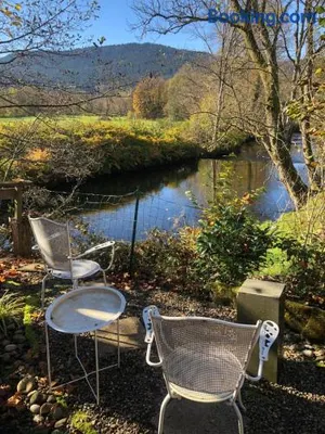 Image of Côté Rive, au bord de la rivière La Moselotte et terrasse