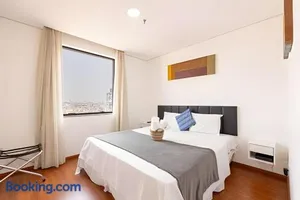Image of Flat confortavel com cozinha, e piscina