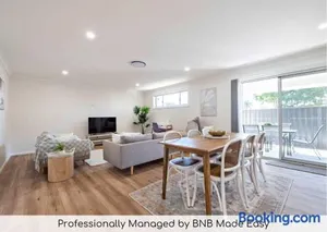 Image of Modern Retreat - Near CBD, 4BR Comfort