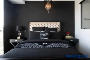 Image of Couture Comfort - Luxe Chanel Themed Apartment