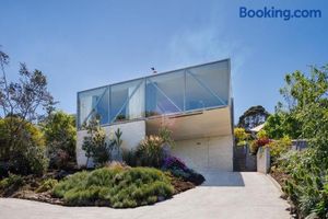 Image of Architectural glass house with ocean views