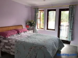 Image of Cozy bedroom in well equipped apartment