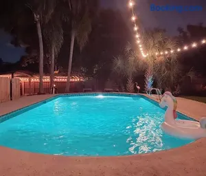 Image of Resort-style home with a Heated Pool and a Huge Gated Yard