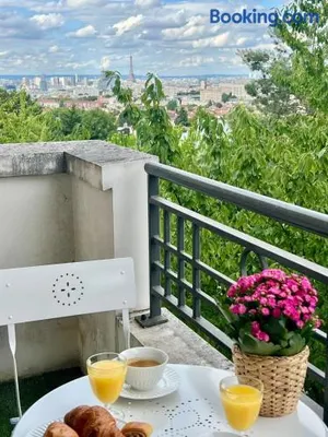 Image of Élégant apt avec vue Tour Eiffel & parking privé