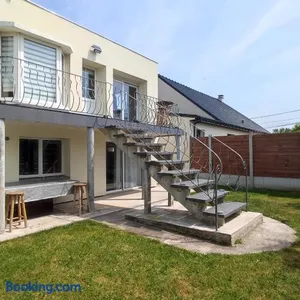 Image of Maison chaleureuse avec parking gratuit sur place