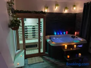 Image of le tricosy jacuzzi et sauna privatif