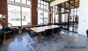 Image of Cozy 1BR with Private Balcony, Gym, Pool & Workspace