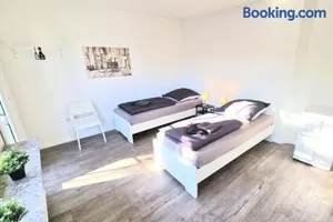 Image of Modern 6-Bedroom Apartment with Rooftop Terrace, free Wi-Fi and Parking- MND01