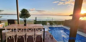 Image of Waterfront Sunset Getaway Pool