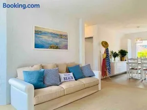 Image of Beautiful, modern apartment seconds from beach