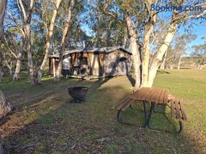 Image of Rustic Cabin with moon bathing for a city escape