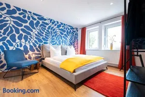 Image of Bunter Hund Apartments - Zentrales Apartment, Parkplatz, Wintergarten, Kinderzimmer
