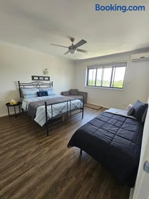 Image of Large Queen Bedroom with Air Conditioner