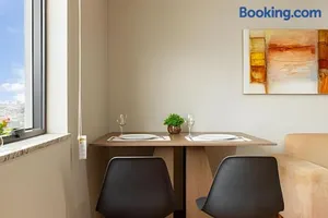 Image of Flat confortavel com cozinha, e piscina