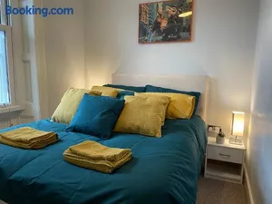 Image of Wall St flat by HNFC Stays - Netflix & Popcorn