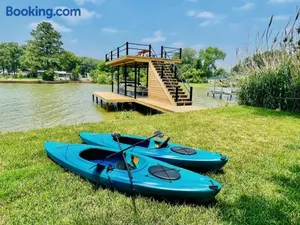Image of The Benjamin I - 2022 Built Luxury Retreat with Backyard Paradise with Hot Tub Outdoor Movie Screen Dock & Boat Rental