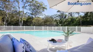 Image of Resort Style Living With Pool, Tennis Court and Beach