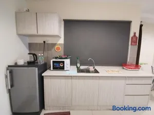 Image of Peaceful 1-bedroom unit at Marina Island by JoMy Homestay