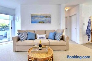 Image of Beautiful, modern apartment seconds from beach