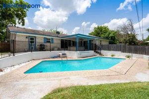 Image of The Breezy Blue View with hot tub and pool