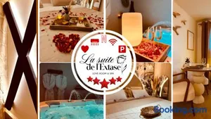 Image of LA SUITE DE L'EXTASE - LOVE ROOM - Jacuzzi privé & Terrasse - Parking et Wifi Gratuit - Elégance & Confort - Une expérience Détente et Sensuelle à votre portée ! OFFRE SPÉCIALE