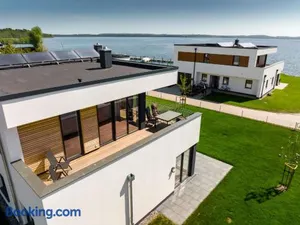Image of Hangar 19 Luxusapartment mit Sauna, Kamin, Dachterrasse und Seeblick H5W3
