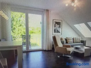 Image of 2-Zimmer-Ferienwohnung mit Hotelservice und 2 Balkons - Golf, Bike und Wellness im Markgräflerland