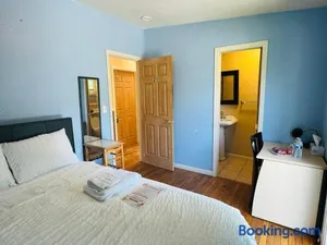 Image of Cozy House Nested Around Trees A