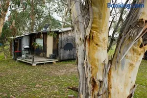Image of Rustic Cabin with moon bathing for a city escape