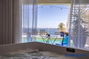 Image of LES SUITES LOVE 1 SPA VUE MER PISCINe