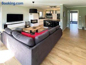 Image of 8 Personen Ferienhaus ,,Seegelblick" am Goitzschesee, erste Reihe am Strand mit Sauna, Kamin & Wallbox