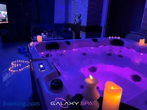 Image of GALAXY SPA - Suite Neptune Jacuzzi et Sauna Privatif