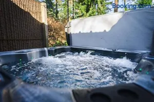 Image of Luxe vakantiehuis in het bos met jacuzzi en sauna
