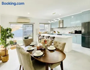 Image of Modern Family Oasis - 4BR, Free Parking, Steps to Shops & Train