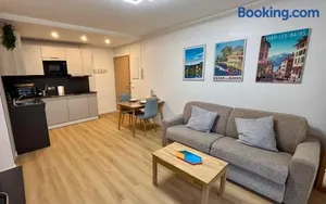 Image of T2 - vue lac - 100 m du Hilton - Garage privé - 4 étoiles