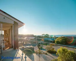 Image of Home & Away at Coles Beach