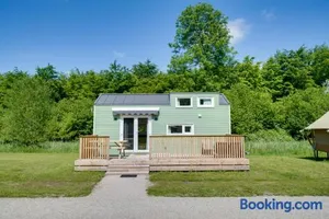 Image of Green Tiny House with shared pool