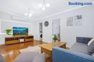 Image of Comfy Family Home @ Kingsgrove Sleeps 7 with 2 Bathrooms & Parking