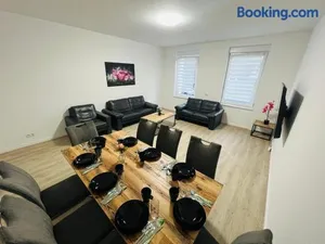 Image of City Apartment - 9 Bedrooms - 22 Beds - WiFi - Kitchen