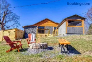 Image of Country Cabin, Fenced area for pets, Hot Tub, Arcade!!!